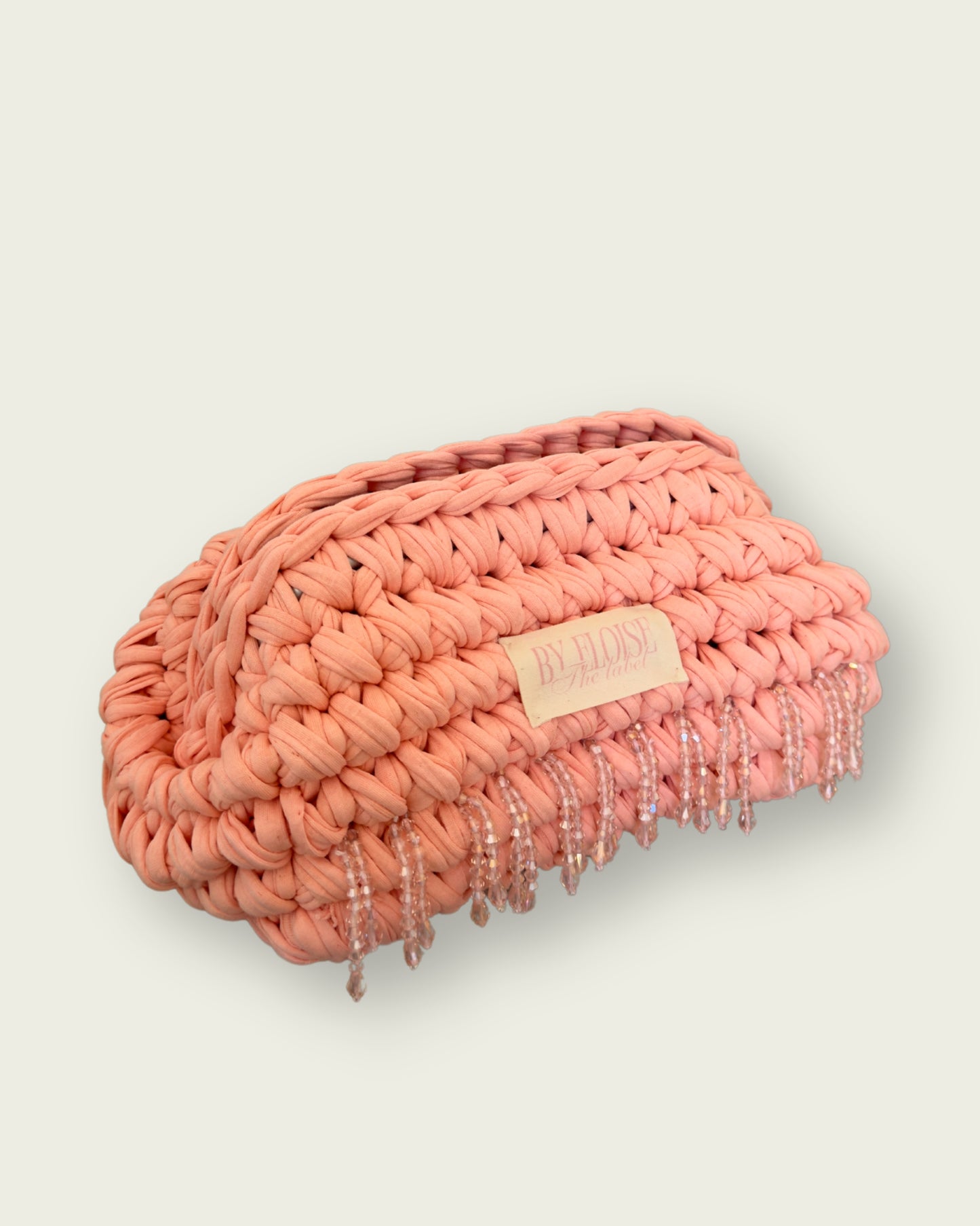 Peach beaded clutch
