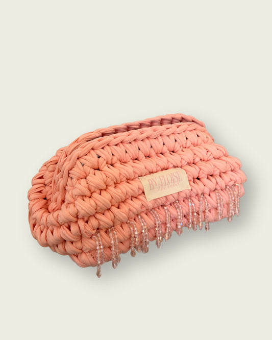 Peach beaded clutch